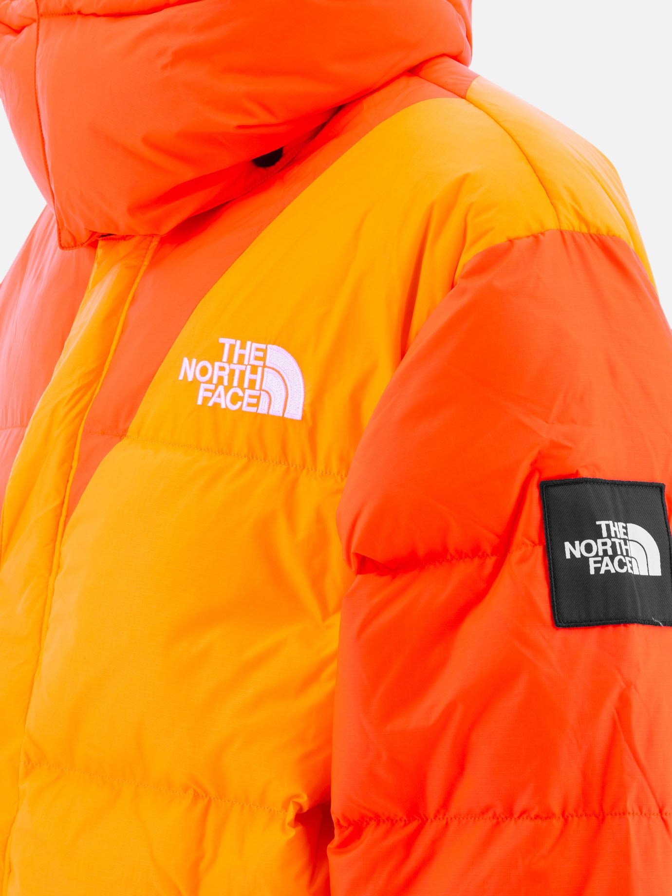 "TNF x Yinka Ilori" down jacket