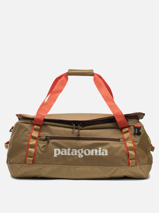 Travel bags 100% recycled polyester  Gold - Patagonia Men | PDP | VIETTI Online Store 
